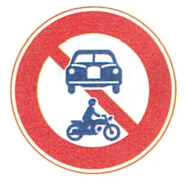 Japanese licence-test illustration: Round red-bordered sign: car + motorcycle crossed out